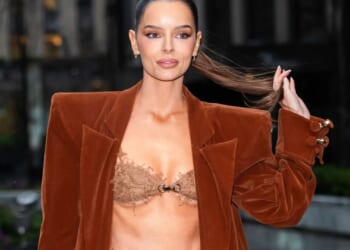 Maura Higgins turns heads with her abs as she steps out in her BRA with oversized coat