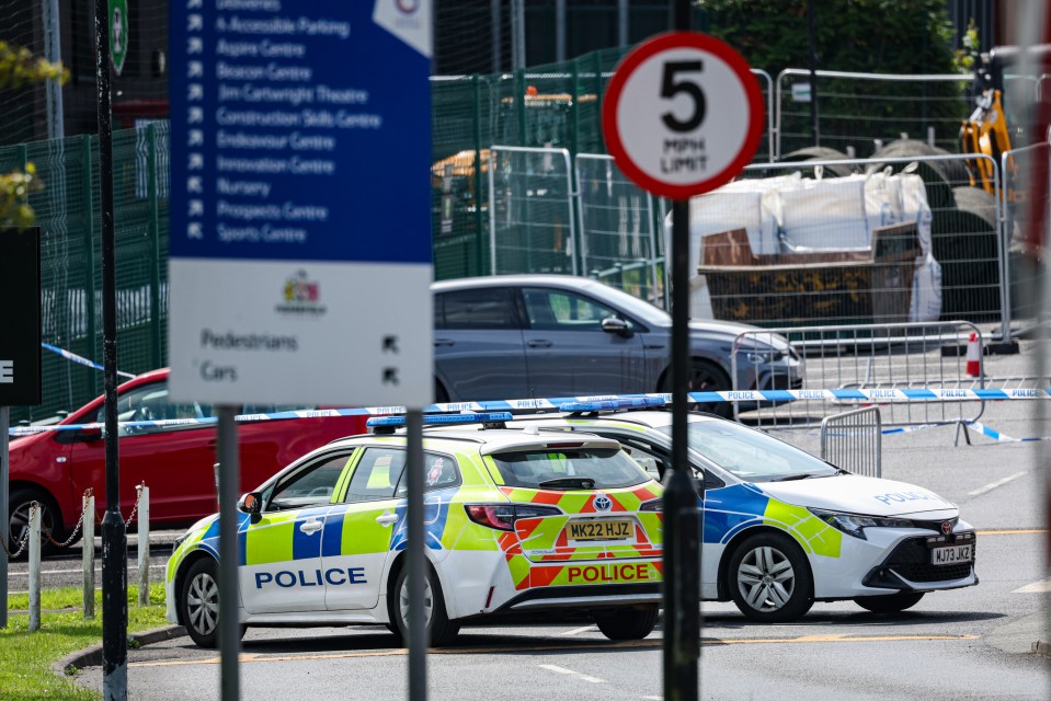 Police forensic investigators at the scene of a murder investigation.