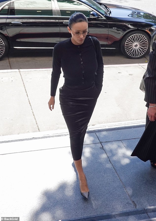 Her towering heels gave a subtle nod to her normally glamorous style