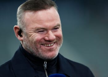 Wayne Rooney smiles as he enjoys takeaway from restaurant part-owned by ex-Man Utd team-mate