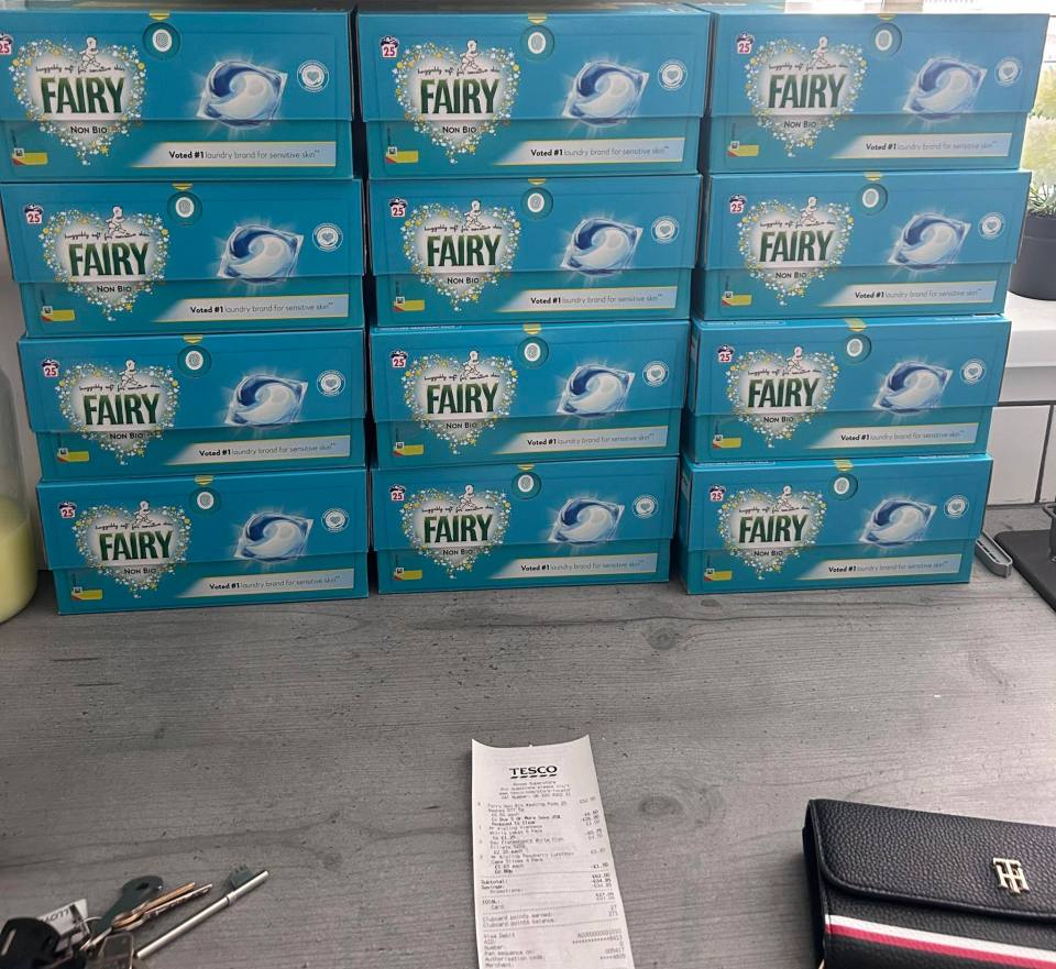 A large haul of 12 boxes of Fairy Non Bio laundry pods and a Tesco receipt.