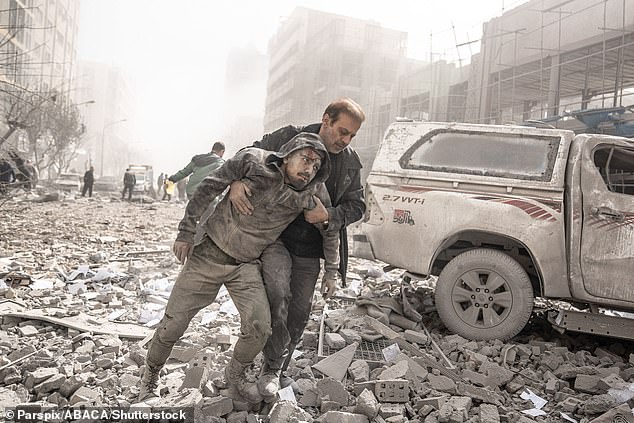 The scene following an US-Israeli airstrike near the Ferdowsi square in central Tehran, Iran, this week
