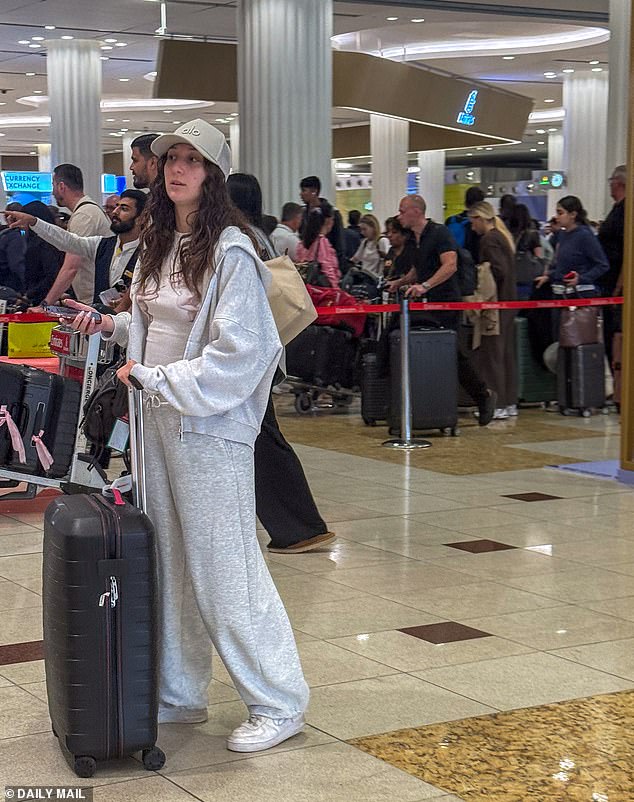 Passengers in the terminal at Dubai Airport this morning as flights are still being affected