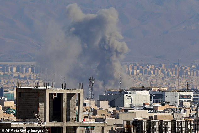 Smoke rises from the site of airstrikes in a central area of the Iranian capital Tehran on March 6
