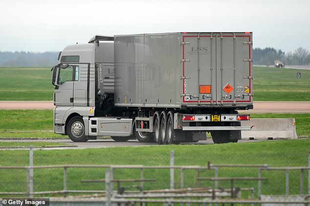Trucks with Class 1.1 explosive hazard warning symbols arrive at RAF Fairford today