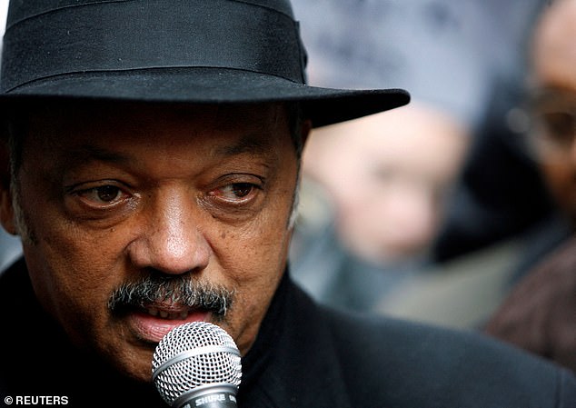 Reverend Jesse Jackson speaks at a rally outside the New York Stock Exchange in New York, December 10, 2007