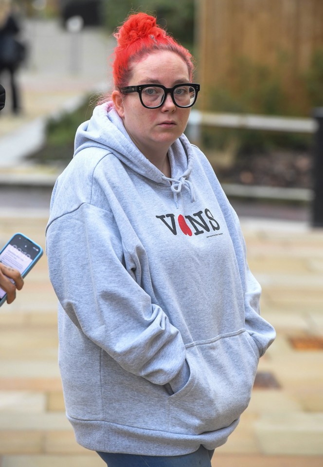 Stacey Sharples arriving at Bolton Crown Court, wearing a gray hoodie with a "VANS" logo and black-framed glasses, facing charges of perverting the course of justice.