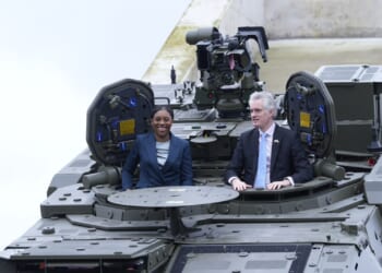 Iran war will spark NEW wave of Channel migrant crossings, warns Kemi as she poses in armoured vehicle