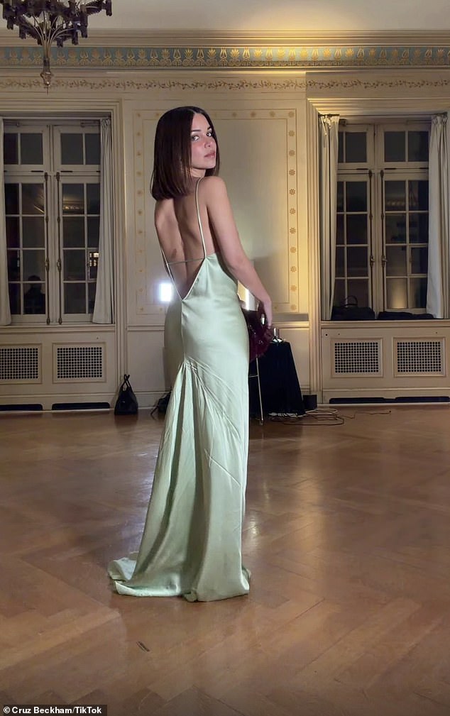In another clip, Jackie posed up a storm for the camera, showcasing her gown from Victoria's, 51, collection