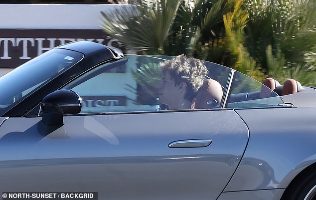 Her youngest son Jayden, 19, was spotted behind the wheel of a convertible on Friday while cruising through the streets of Los Angeles