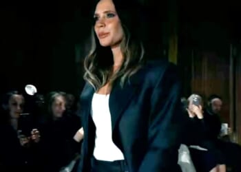 Victoria Beckham looks emotional as she's supported by husband David and three kids amid feud with eldest son Brooklyn