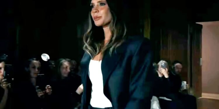 Victoria Beckham looks emotional as she's supported by husband David and three kids amid feud with eldest son Brooklyn