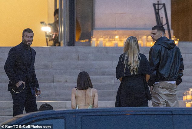 Ahead of Friday's show, Victoria's husband David was seen making his way into the venue for the show, closely followed by their children Romeo, Cruz and Harper