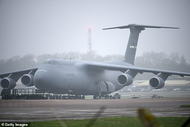 A US Air Force C-5 Galaxy stands on the apron at RAF Fairford after it and a B1 Lancer bomber landed Friday night