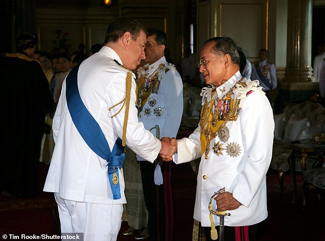 Mr Lownie also claimed that on one 'famous' trip to Thailand, the disgraced former prince had 40 prostitutes brought to his five-star hotel over just four days. Pictured: Andrew and King Bumibhol Adulyadej in Bangkok in June 2006