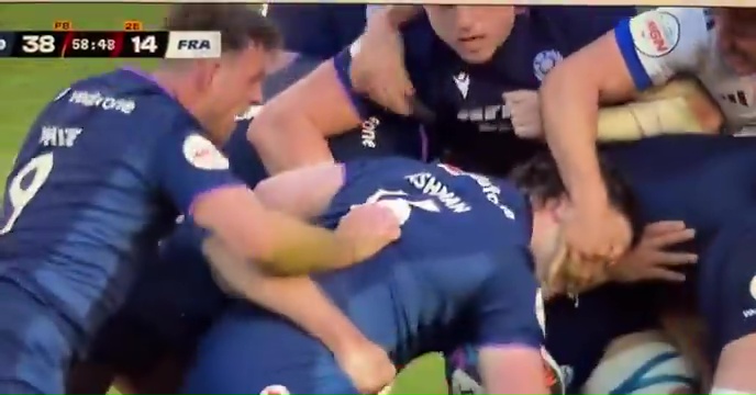 A French rugby player appears to gouge the eyes of a Scottish rival during a Six Nations match.