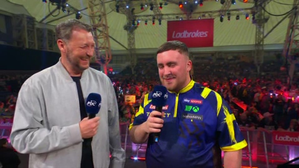 Luke Littler being interviewed after a darts match.