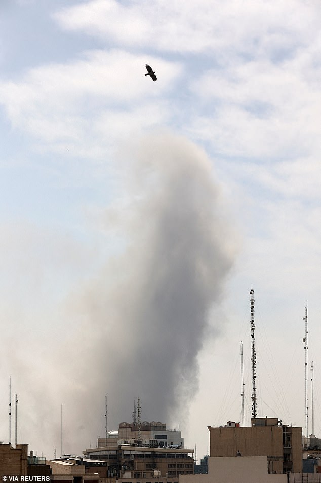 Iranian President Masoud Pezeshkian apologized to Gulf neighbors for military strikes targeting their countries, as Trump has promised 'complete destruction' of Iran. Pictured is smoke from an explosion in Tehran on Saturday
