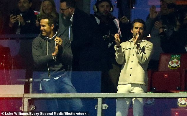 Ryan Reynolds (left) and Rob McElhenney (right) enjoyed the display put on by their side