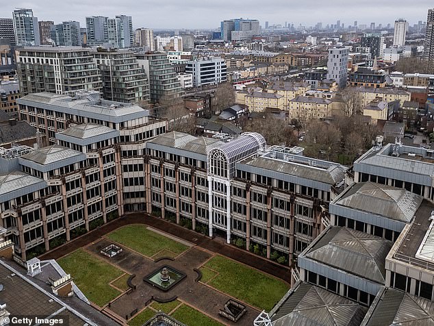 The arrests have led the Tories to redouble their calls for China to be prevented from moving forward with proposals for the biggest diplomatic base in Europe on the site of the old Royal Mint (pictured, file photo), close to underground fibre-optic cables carrying sensitive financial information