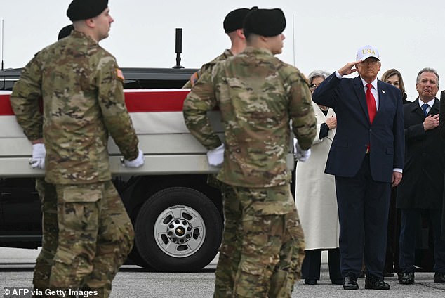 Soldiers carried their fellow comrades, whose caskets had an American flag overlayed