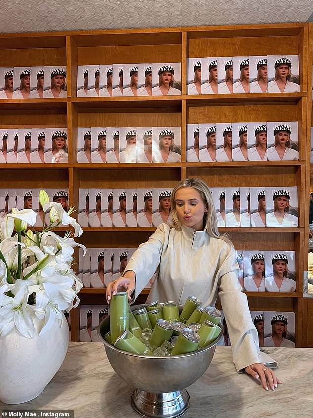 The chic co-ord featured a funnel-neck collar, long sleeves and a zip-up fastening, paired with matching trousers complete with cuff button detailing