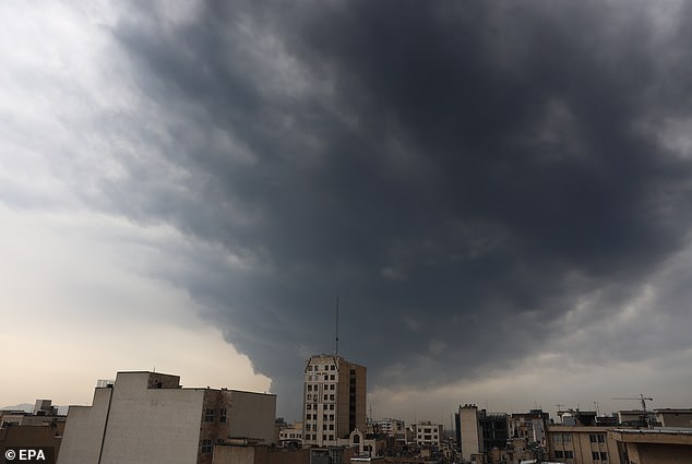 Smoke rises from Tehran's oil refinery following last night airstrike in Tehran, Iran, March 8 2026
