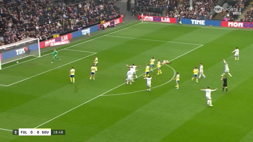 A football game with players on the field and a scoreboard showing "FUL 0 0 SOU 18:48".