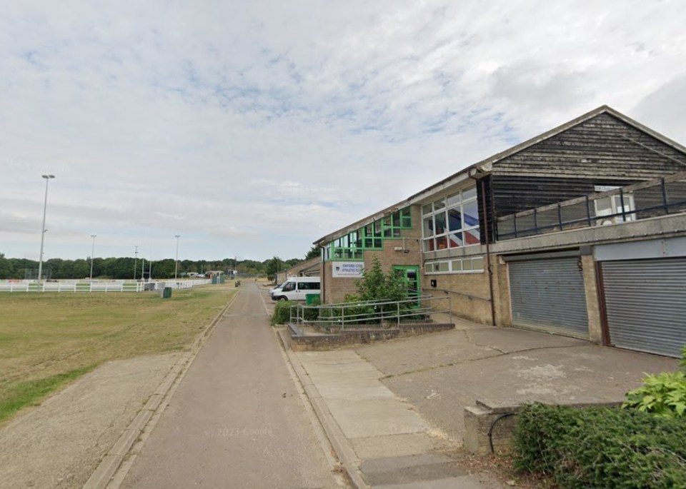 Exterior of the Oxford City Athletic Club building with an athletic field to the left.