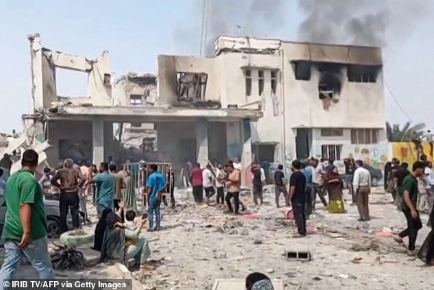 The bombing that killed 175 people, mostly children, on February 28. People are seen at the site after the strike