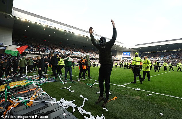 Celtic won the game and away fans entered the field in celebration, but Rangers supporters responded