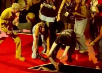 Watch the shock moment female fan suffers nasty fall on stage during Machine Gun Kelly’s London gig