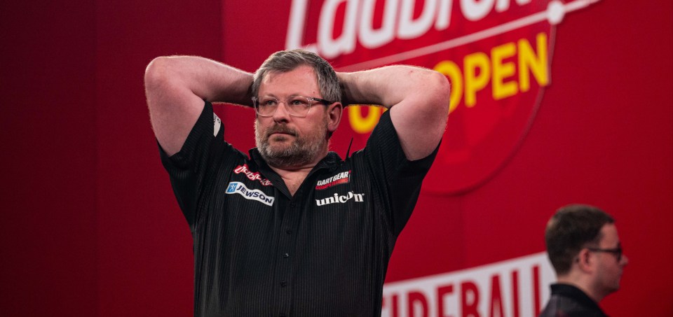 James Wade of England celebrating his quarter-final win at the PDC Ladbrokes UK Open Darts Final Night.