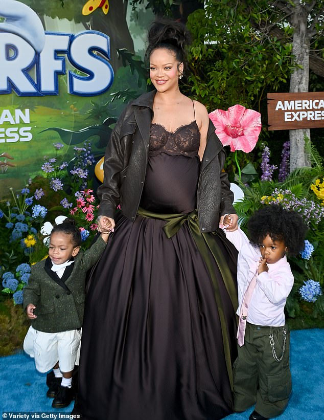 Rihanna and her longtime partner live in the $14 million mansion with their children; Rihanna seen with RZA and Riot in 2025