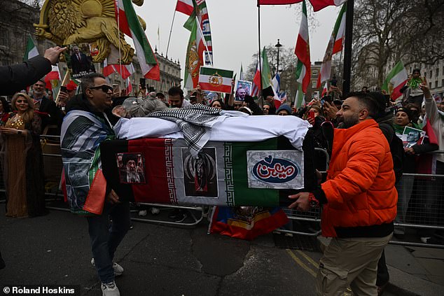 Several effigies mocked the death of the Ayatollah were displayed. One depicted him as a rat being carried in a coffin