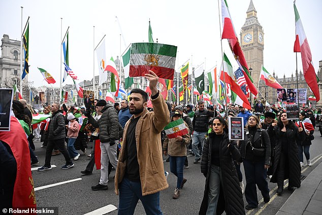 On top of national flags, several people were seen waving flags of the Israeli military