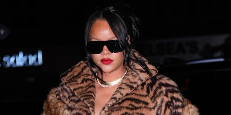 Shots fired at Rihanna's mansion when singer was inside as woman in her 30s is arrested