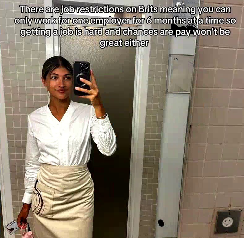 A young woman taking a mirror selfie with text discussing job restrictions for Brits.