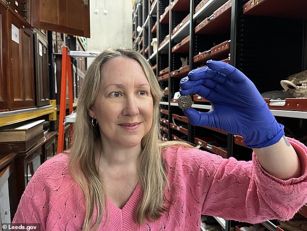 The coin will now be kept at Leeds Discovery Centre after Peter donated it. Pictured: The coin the hands of Cat Baxter, curator of archaeology and numismatics for Leeds Museums and Galleries,