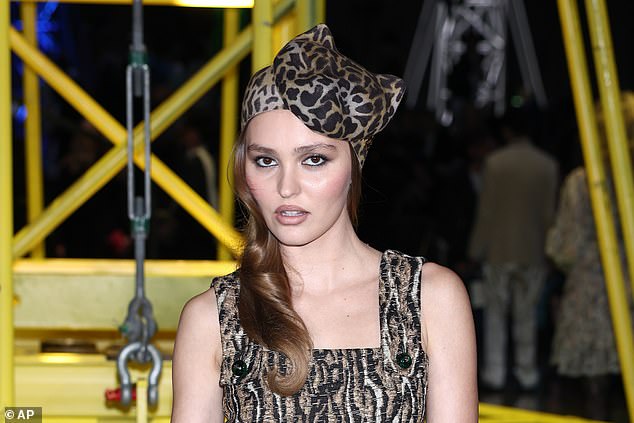 Model Lily opted for a stylish animal print look