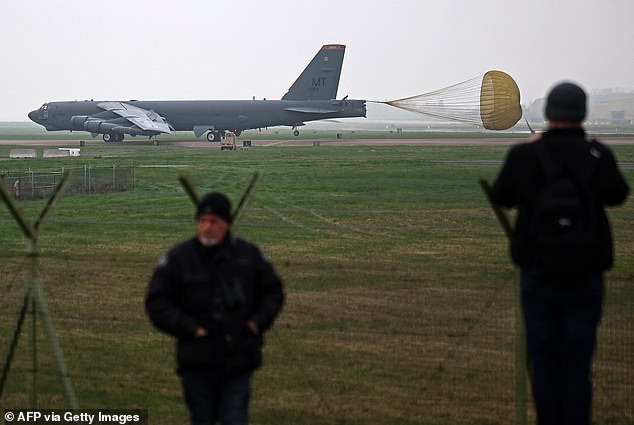 A US Air Force Boeing B-52 Stratofortress bomber jet taxis on the runway after landing at RAF Fairford in south west England on March 9