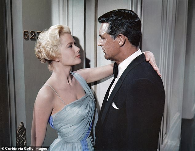 Grant with Grace Kelly in To Catch a Thief by director Alfred Hitchcock