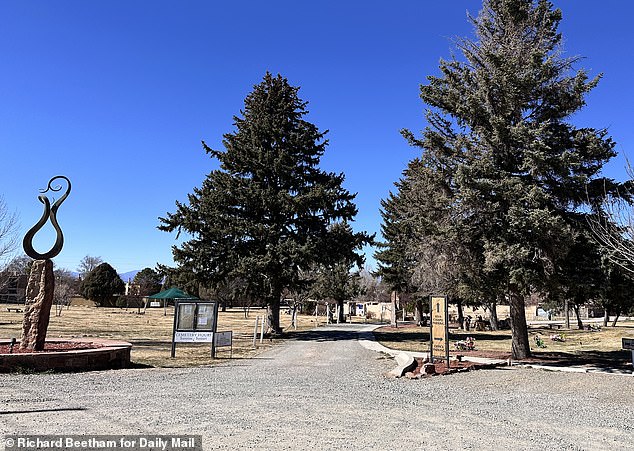 The couple were buried in a quiet section of the memorial gardens during a private ceremony attended by Hackman's three children