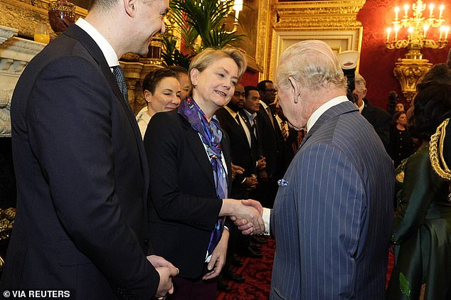The King greets Foreign Secretary Yvette Cooper during the special event