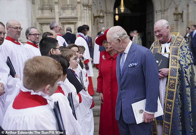 Charles chats to choir members outside Westminster Abbey after Monday's event
