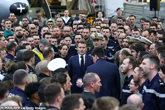 Patriotic: Emmanuel Macron sings France’s anthem on aircraft carrier Charles de Gaulle in Cyprus