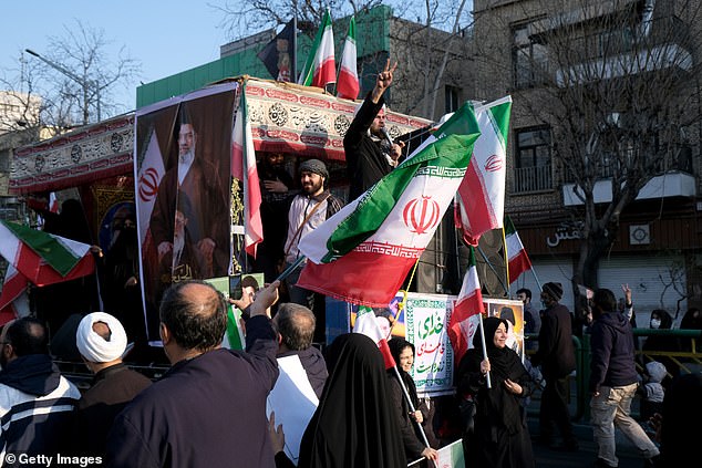 Iranians show their support for Mojtaba during celebrations in the capital on Sunday
