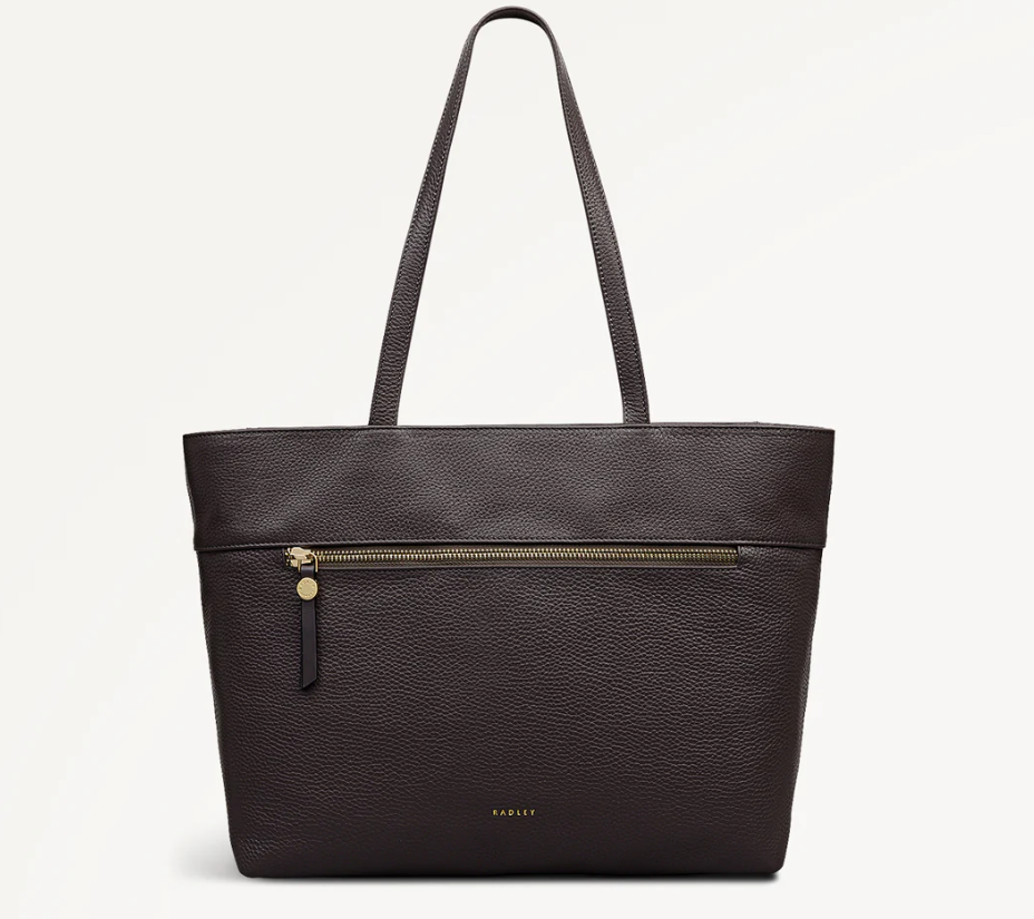 A brown Radley tote bag with a zippered front pocket.