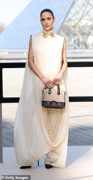 Jennifer Connelly cut a glamorous figure in a white sleeveless dress