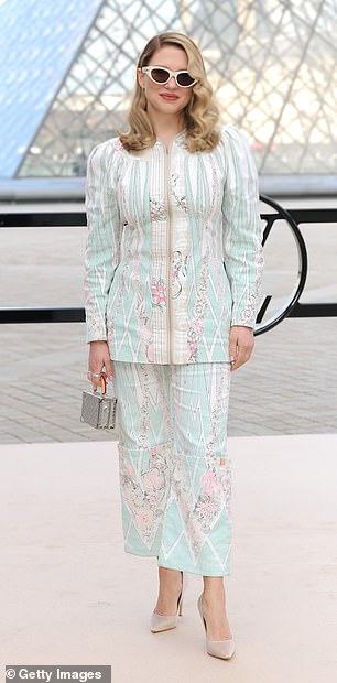 Lea Seydoux looked radiant in a baby blue and pink shirt and matching trousers
